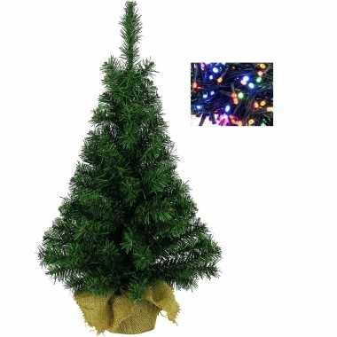 Volle mini kerstboom groen in jute zak 45 cm met gekleurde kerstverlichting